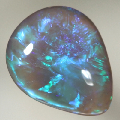 SOLID BLACK CRYSTAL OPAL Loaded with bright colours